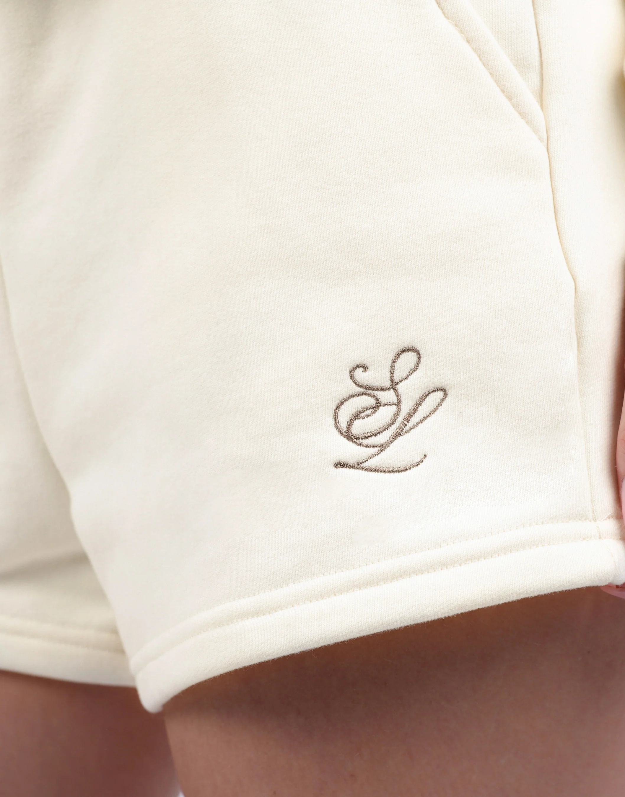 Riva Simmi Studios Embroidered Logo Shorts In Cream - Image 5